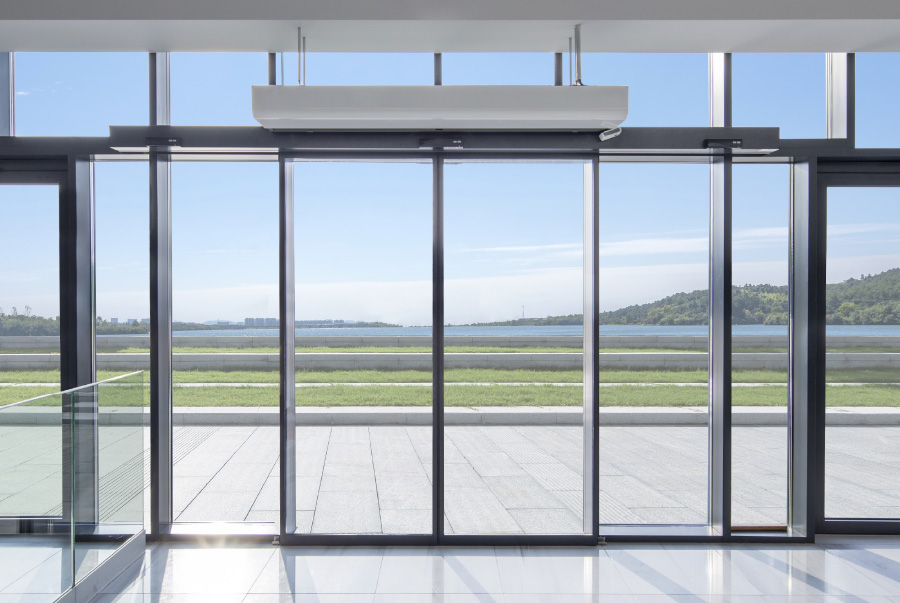 Puerta Corredera Automática - ventanas de aluminio y PVC Cortizo
