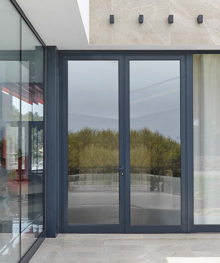 Puerta Millennium 2000 - ventanas de aluminio y PVC Cortizo